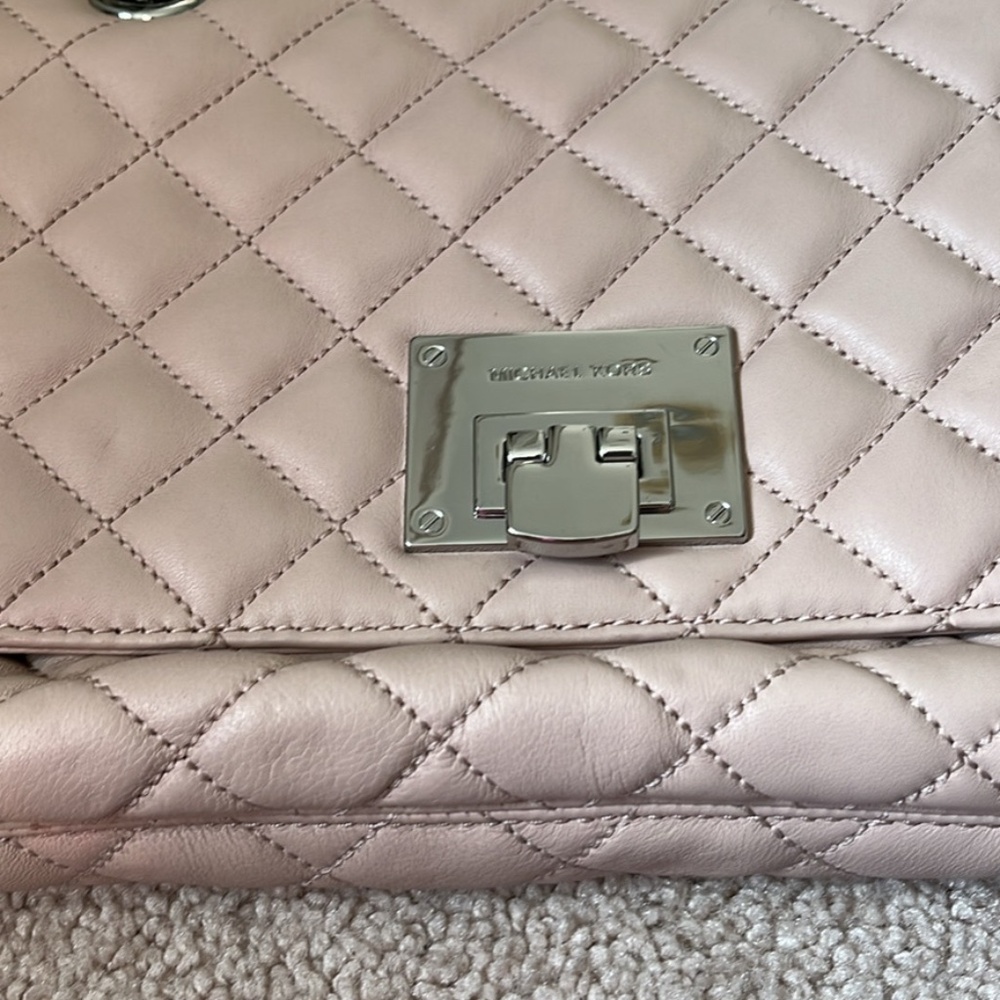 Michael Kors blush pink quilted leather bag.